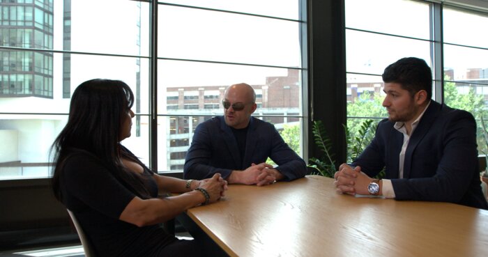 Chad E Foster facilitating corporate meeting with business team